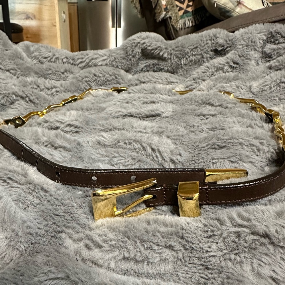 Gold Belt with brown faux leather band. 36” length
